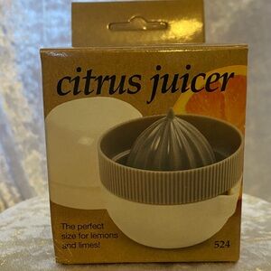 Citrus Juicer in white & gray.